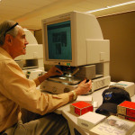 Thomas C. Sanger researching newspaper microfilm, New York Public Library, NYC. (5/2/2012)